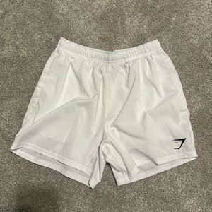 white gymshark 5’ inseam athletic shorts